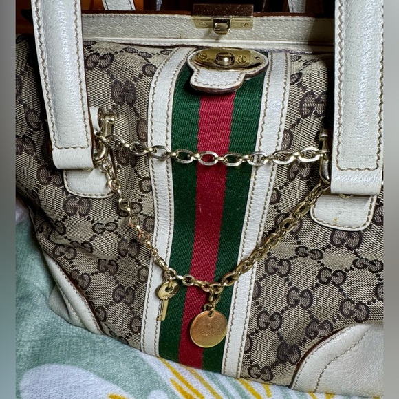 40% PRICE DROP!!
$4777 (was $795)
GUCCI Treasure Boston w/Key And Charm - Picture 11 of 16